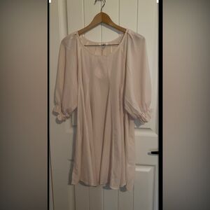 Women’s elegant cream colored dress